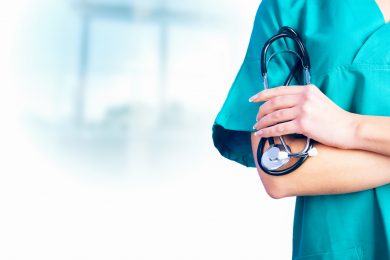 Female Doctor holding a stetoschope in her hands